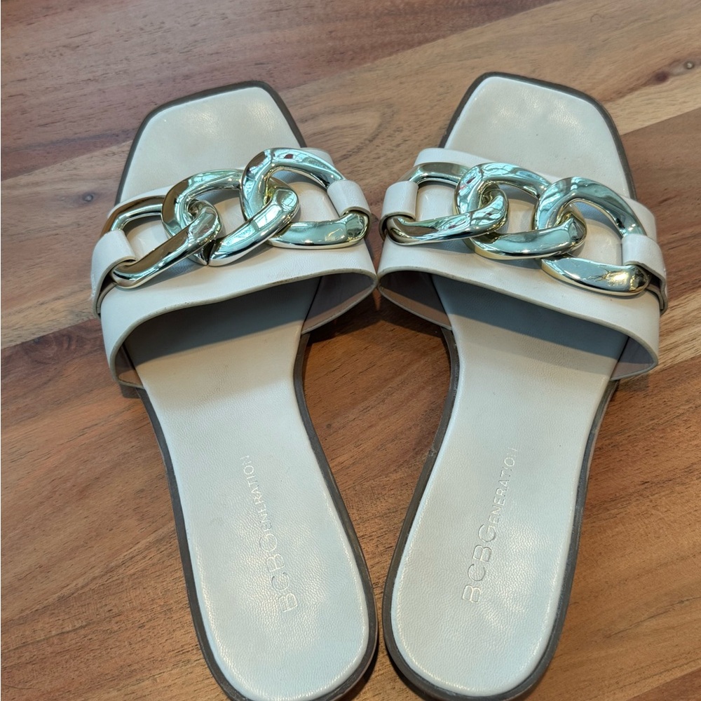 BCBG Generation Black, Cream, and Gold sandals